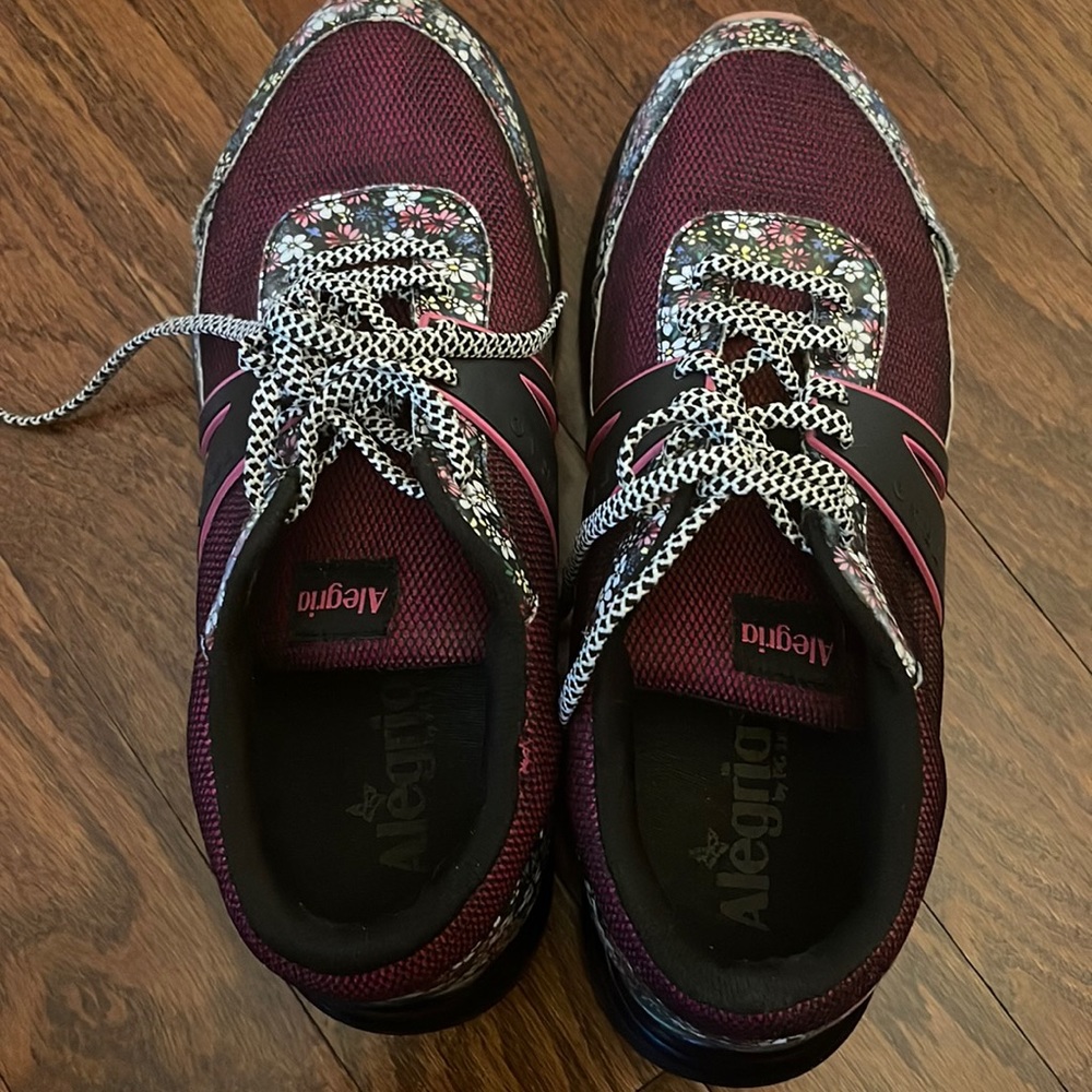 Womens Alegria Traq Qarma. A rip on left and right upper corner. No hole